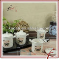 small butterfly storage jars with iron holder